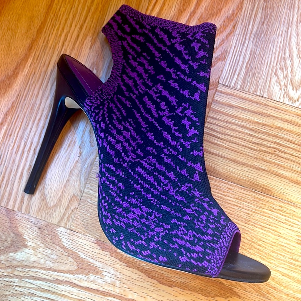 Never worn, 4” stiletto. Upper is black and purple knit, from Zara, size 8.
